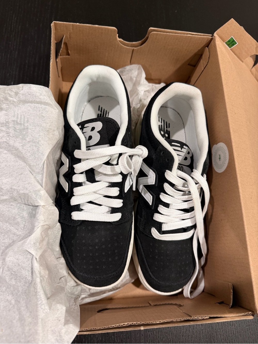 New Balance Men's Black and White Low-Top Sneakers
